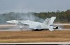 F18 Super Hornet slides off Pensacola NAS runway after blowing both tires after air show 1.jpg