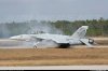 F18 Super Hornet slides off Pensacola NAS runway after blowing both tires after air show.jpg